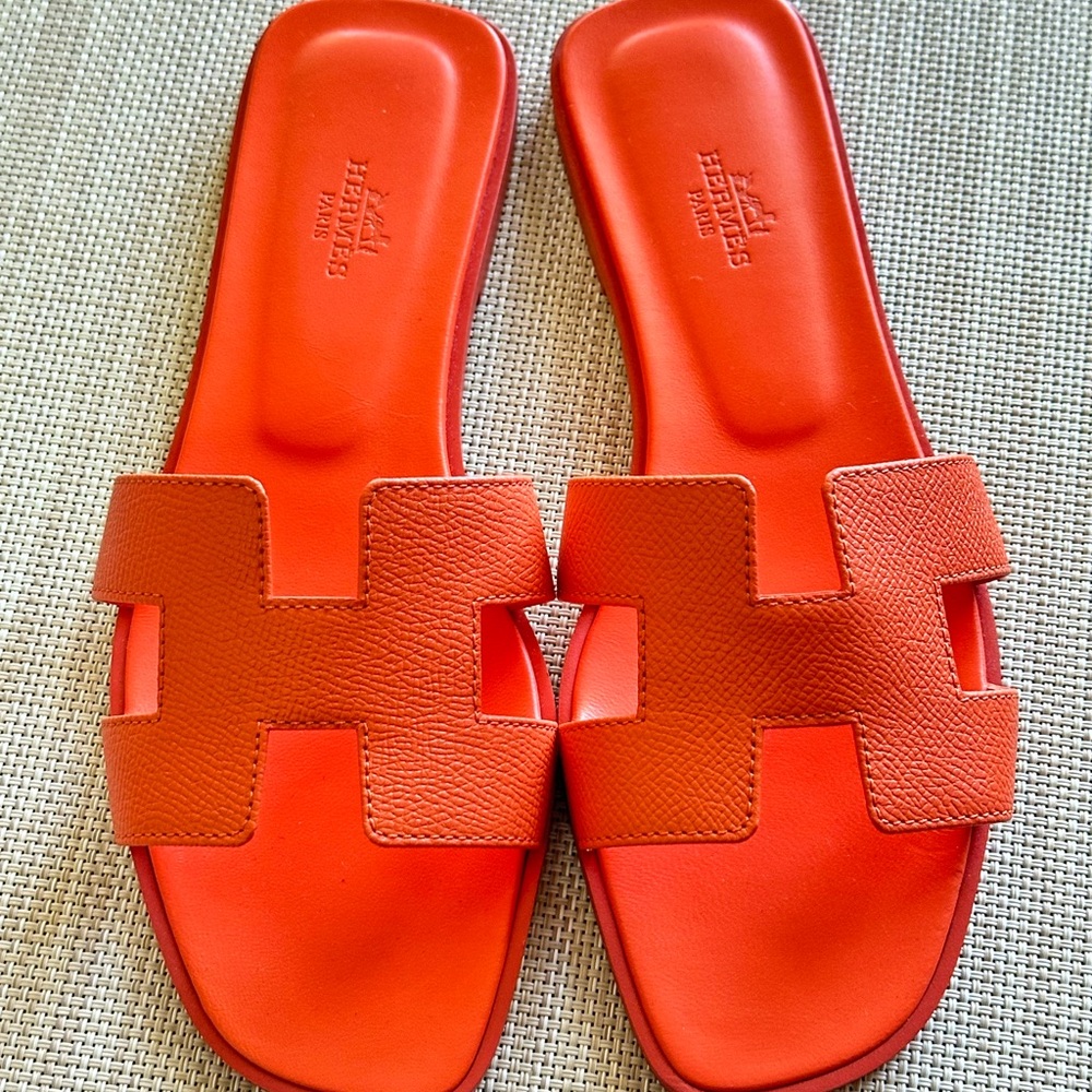 Hermes, Oran sandals! Brand new, limited edition  Hermes all orange.